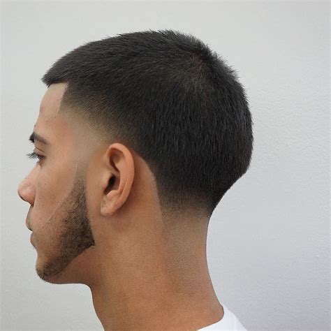 Jul 30, 2019 · High and Tight Buzz Cut. The high and tight is also a fade style, and is often considered a type of crew cut. What distinguishes it, though, is all in the name: The sides are kept short all the ... 